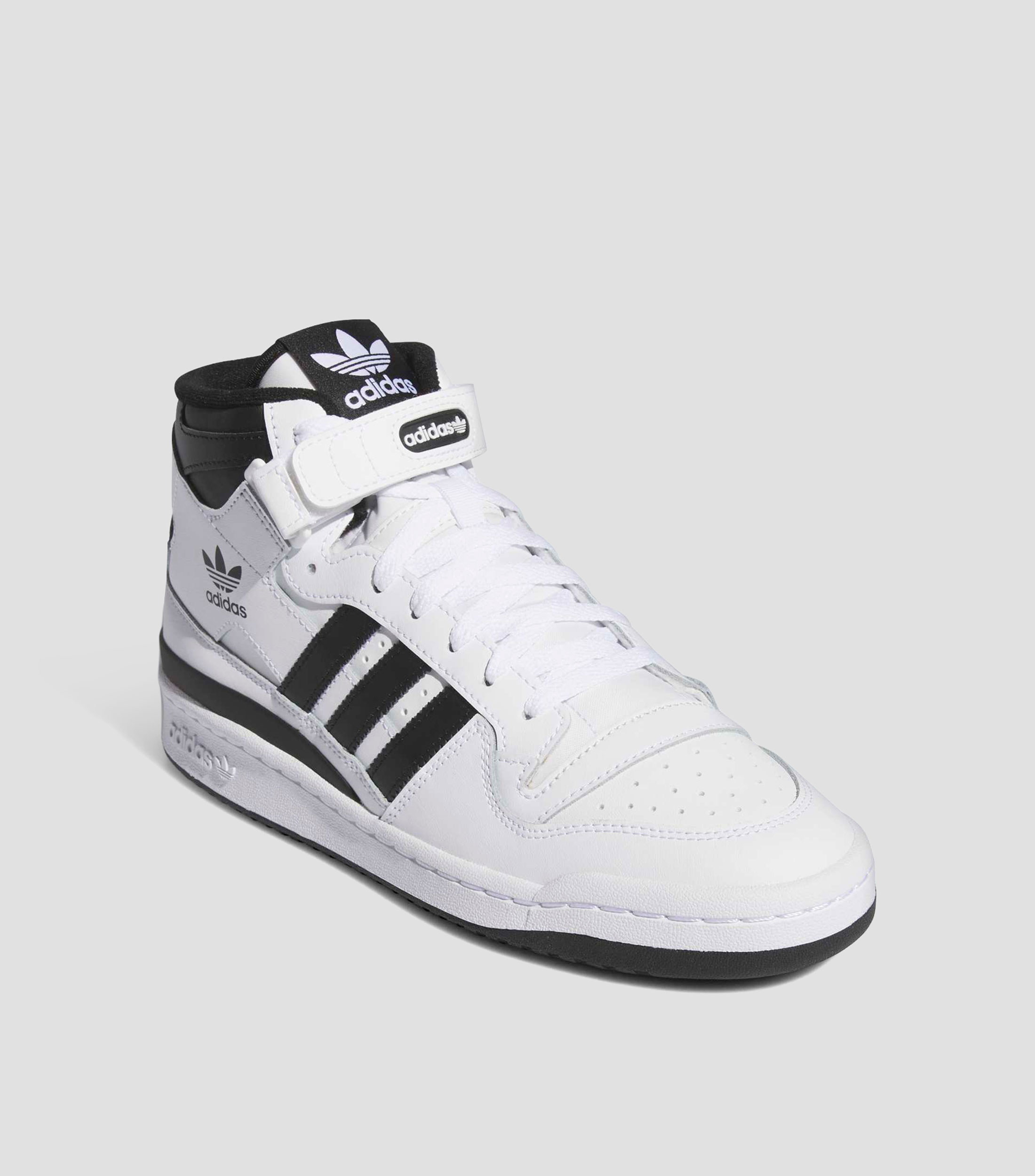 Tenis casuales en piel Forum Mid Hombre